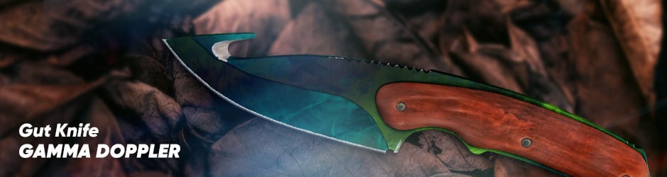 Gamma Doppler Gut Knife in CS2 displaying gemstone-like green phases with a reflective, marbled blade.